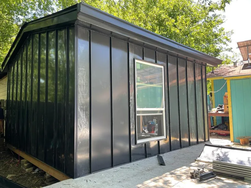 Black standing seam metal wall panels for Metal Roof Installation in Fort Stockton